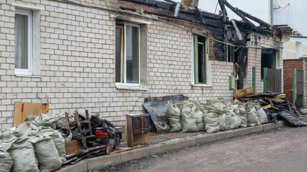 Professional Fire Damage Repair technician working in Hydes, MD